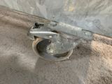 a close up of a metal object on the ground