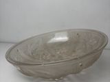 a glass bowl that is sitting on a table
