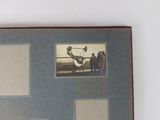 a picture of an old photo of a man and a woman with a plane