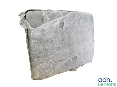 a piece of plastic wrapped around a piece of wood