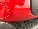 a close up of a red car ' s tail light