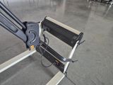 a dolly that is attached to the back of a chair