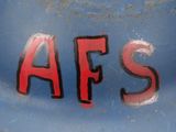a sign that says afs on the side of a blue truck