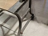 a table and chairs in a room with a lot of furniture