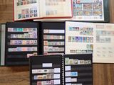 a lot of stamps in a book on the floor