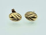 pair of yellow gold plated stud earrings with wavy design