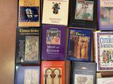 a lot of books that are sitting on a table