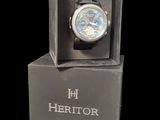 a watch that is in a box on a table