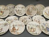 many plates with different designs on them on a table