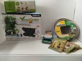 a box of plants and a package of seeding supplies on a shelf