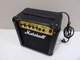 a close up of a guitar amplifier sitting on top of a table