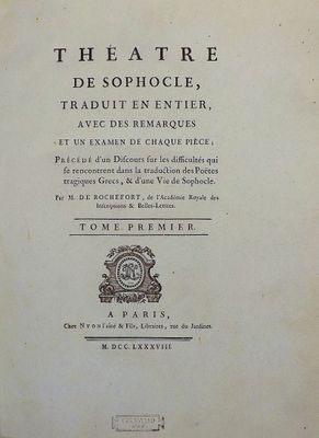 an old book with a picture of a clock on it