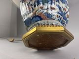 a close up of a vase on a table