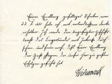 une lettre écrite à l'encre noire sur une feuille de papier
