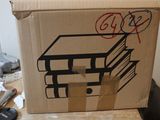 a cardboard box with a drawing on it sitting on a table