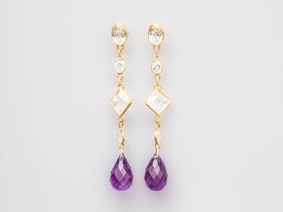 a pair of amethorate and diamond earrings