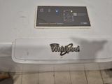 an image of a whirlpool washing machine in a bathroom