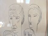 un dessin représentant la tête d'une femme avec trois visages différents