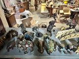 a table with a lot of figurines and other items on it