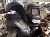 a box full of helmets and other items in a warehouse