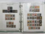 a lot of stamps on the pages of a book
