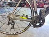 a close up of a bike with a chain attached to it