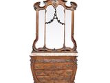 une photo d'une commode surmontée d'un miroir
