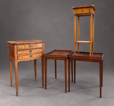 three pieces of furniture are sitting on a gray surface
