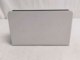 the nintendo wii console is sitting on a white surface