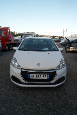 a white car that is parked in a parking lot