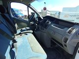a view of the inside of a truck from the driver ' s seat