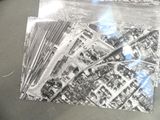 a black and white photo of an aerial view of a city