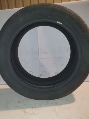tires are stacked on top of each other on a table