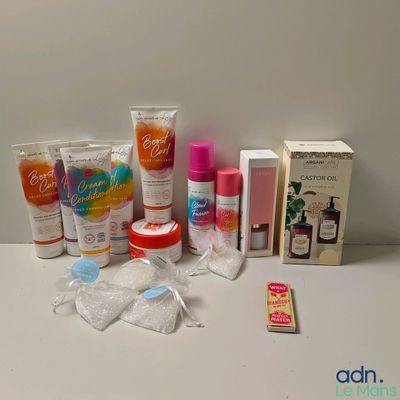 many different types of skin care products sitting on a table