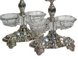 pair of silver plated candlesticks with crystal glass bowls