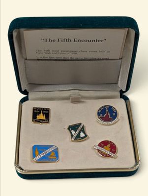 an image of a box with a bunch of pins in it