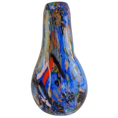 a glass vase that has a blue and red design on it