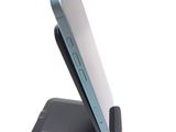 a cell phone that is sitting on top of a stand