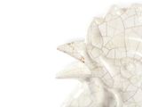 a white plate with a flower on it