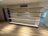 the empty shelves in the store are empty and ready to be used
