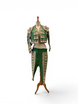 an image of a mannequin wearing a green and white outfit