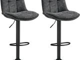 une paire de tabourets de bar en tissu gris avec des pieds en métal noir