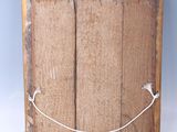 an image of a picture of a wooden frame with a smile drawn on it