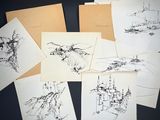 six cards with drawings of boats and buildings on them on a table