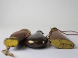 three different types of wooden items on a white surface