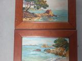 two paintings of a beach scene with a tree and a body of water in a wooden frame