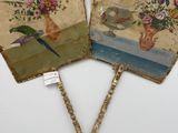 pair of hand painted fan with flowers and birds on them