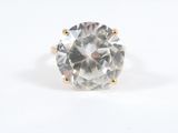 an image of a diamond ring on a white surface