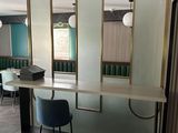 a room with a counter and a chair in it
