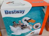 a box with a picture of two people on an inflatable duck